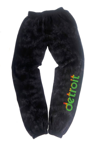 black tie dye joggers with PEAK Detroit design on bottom right leg