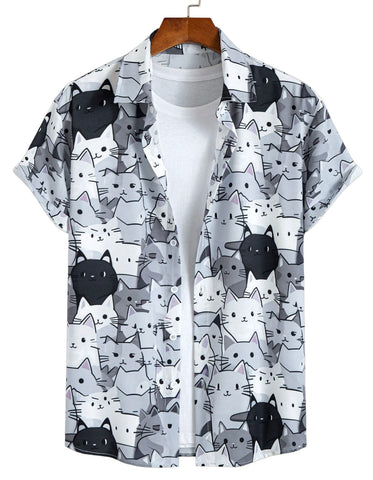 Short-sleeve shirt with black and white cat pattern on a hangar against a white background