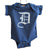 Old English D, white print on indigo blue, Detroit Baby Onesie. Well Done Goods by Cyberoptix