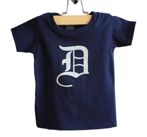 Old English D, white print on navy blue, Detroit Baby Tee. Well Done Goods by Cyberoptix