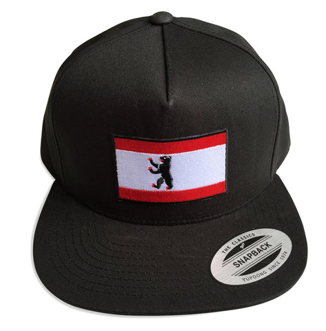 Berlin City Flag Snapback Cap, black. Well Done Goods