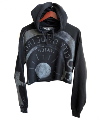 Manhole Cover Print Women's Cropped Pullover Black Hoodie, Spirit of Detroit.