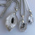 Petroleum Included Diamond Quartz Pendants