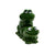 Two green ceramic frogs in a suggestive position on a white background. 