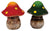 Two ceramic mushroom figurines, one red and one green, on a white background.
