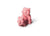 Two pink ceramic pigs in a suggestive position on a white background. 