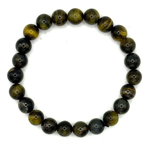 Beaded bracelet with blue golden stones on a white background