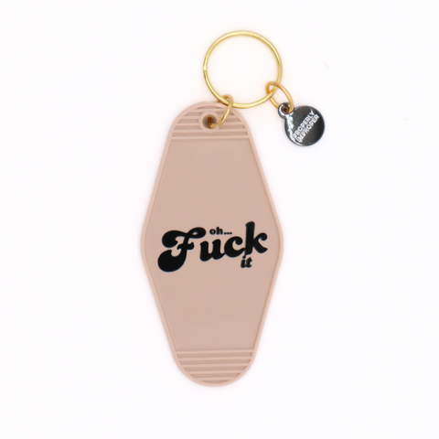 Motel style keychain with the text "Oh... Fuck it" on a white background.