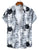 Short-sleeve shirt with black and white cat pattern on a hangar against a white background