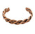 A twisted copper-toned metal cuff bracelet on a plain white background.