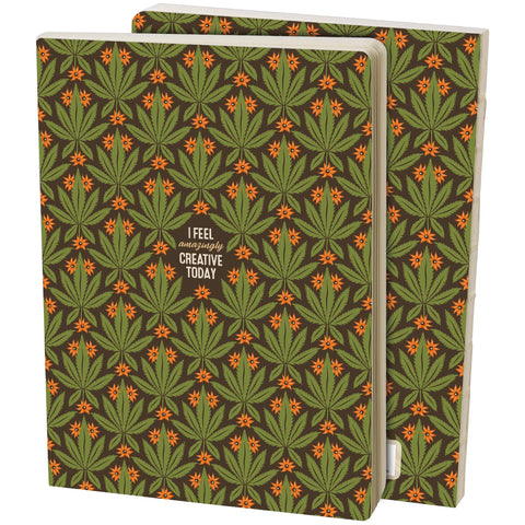Notebook with cannabis leaf pattern and cover reads "I feel amazingly creative today."