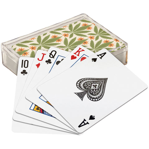 Playing cards with a marijuana leaf design on the back of the cards. Cards are in an acrylic case. 
