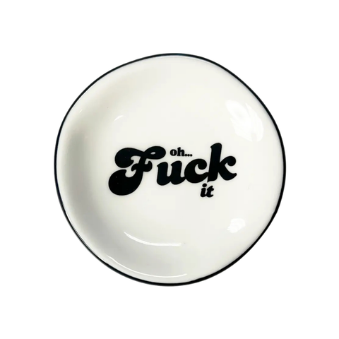 White ceramic dish with black text 'oh... Fuck it' on a white background.