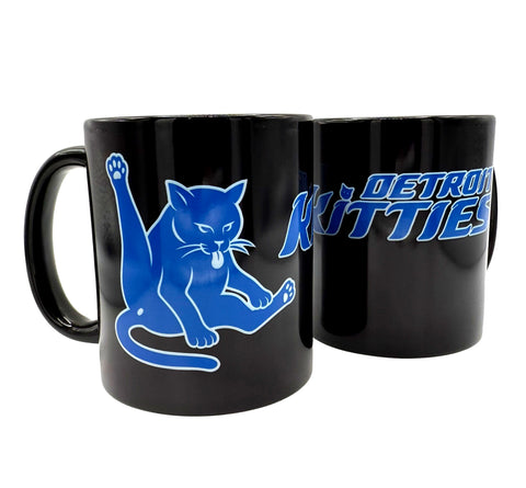 Black mugs with blue cat logo and 'Detroit Kitties' text on a white background