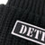 Detail: Detroit Chunky Knit Beanie, Biker Style Patch Beanie Cap. Black with cuff