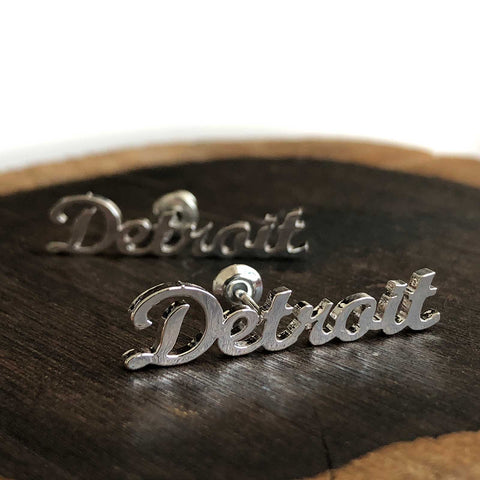 Detroit Script Stud Earrings, silver. Well Done Goods