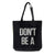 Don't Be A D Bag Tote Bag, Detroit Old English D. Silver on black, Well Done Goods