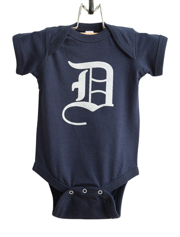 Old English D, white print on navy blue, Detroit Baby Onesie. Well Done Goods by Cyberoptix