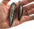 Orthoceras Fossil Pendants, Large and Small Black Marble Necklaces, by Well Done Goods
