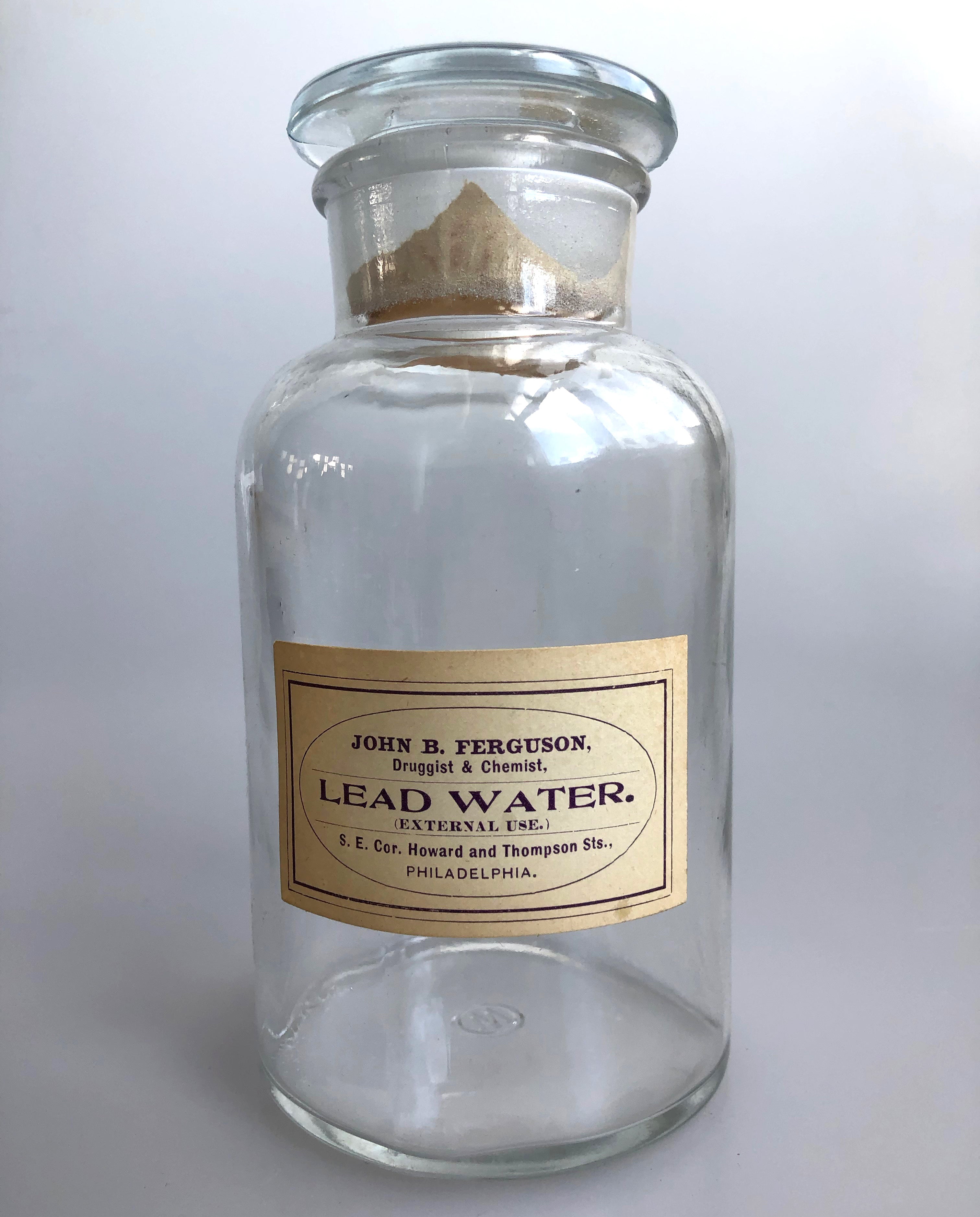 https://welldonegoods.com/cdn/shop/products/vintage_lab_glass_poison_bottles-lead-water.jpg?v=1608742083