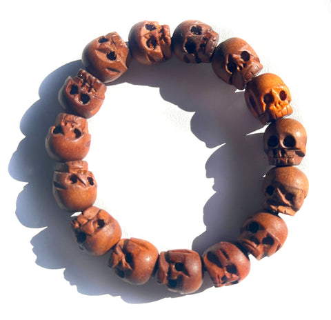 Wooden Skull Bead Stretch Bracelet. Sustainable Hand-Carved Suar Wood